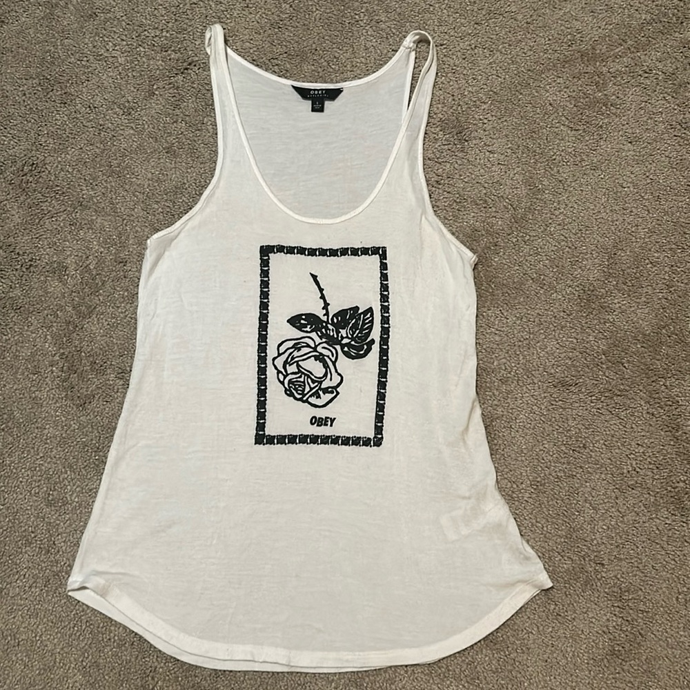 Obey Small white tank, with Obey logo on front with rose design.
